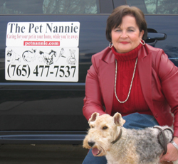 Betty with Rollie next to Pet Nannie car